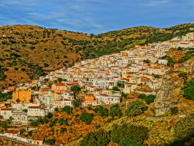 a white buildings on a hill